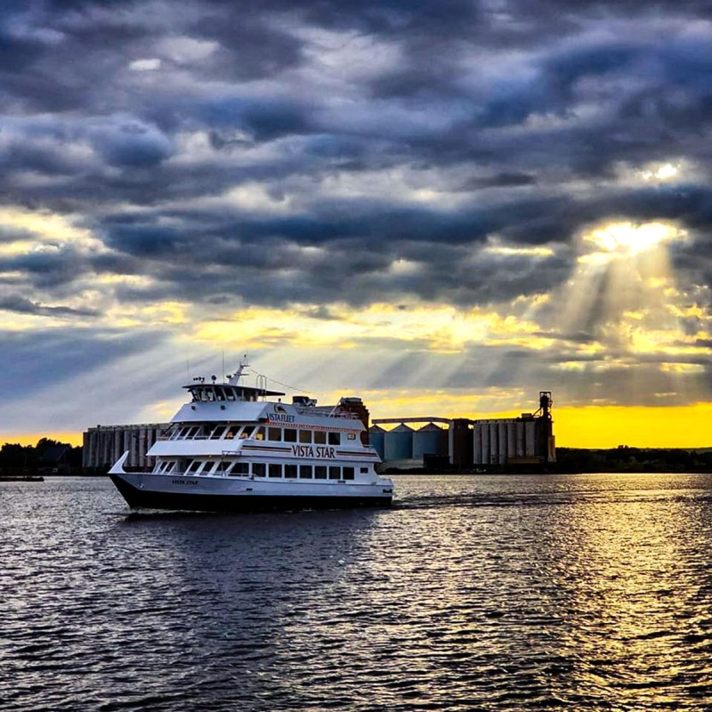 a close up of a boat next to a body of water
