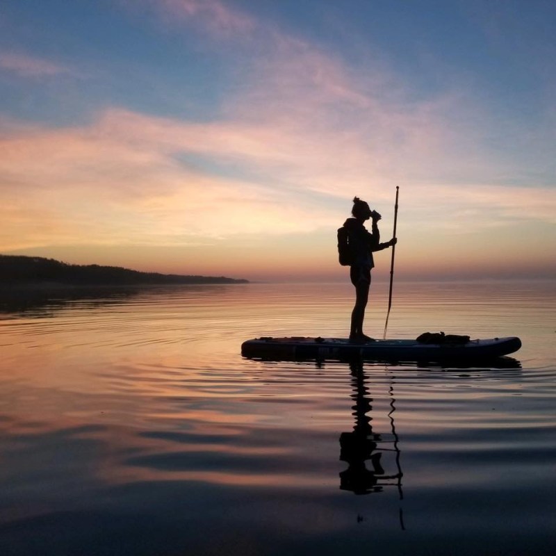 a sunset over a body of water